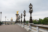 Fototapeta Paryż - Pont Alexandre III bridge and invalides i