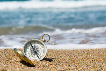 Compass on the beach