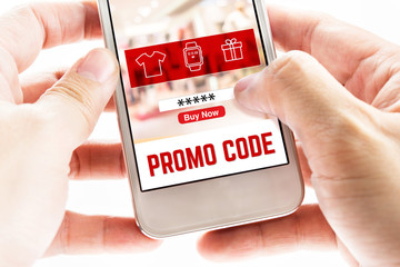 Poster - Close up Two hand holding mobile phone with Promo code page and