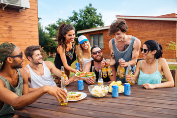 Sticker - Teenage friends having picnic party outdoors