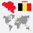 Belgium map on a world map with flag and map pointer. Vector illustration