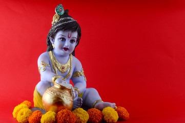 Hindu God Krishna on red background