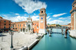 Venetian Arsenal in Castello region in Venice. Long exposure image technic with motion blurred clouds