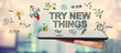 © Tierney - Try New Things concept with man holding a tablet