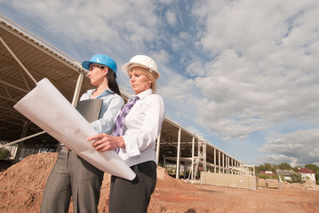 two engineers at construction site