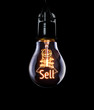 Hanging lightbulb with glowing Sell concept.