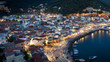 Lights of Parga Greek village by night, Greece, Ionian Islands