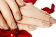 © looking2thesky - Perfect manicure. Woman hands with manicured natural beige nails . Beautiful female fingers with natural beige manicure. Spa and cosmetics. Close-up of beautiful fingers with nails polish