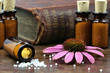 homeopathic echinacea pills on wooden background