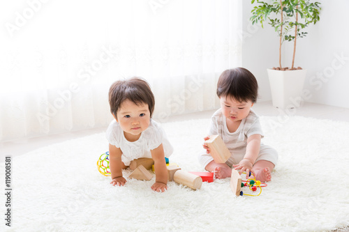 Fototapeta portrait of asian baby playing