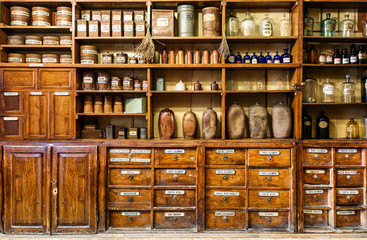 bottles on the shelf in old pharmacy
