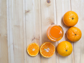 Fresh orange and orange juice in glass