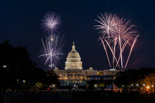 US Capitol In Washington And Fireworks.