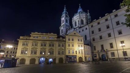 Wall Mural - Night view of the illuminated malostranske namesti square timelapse hyperlapse in prague