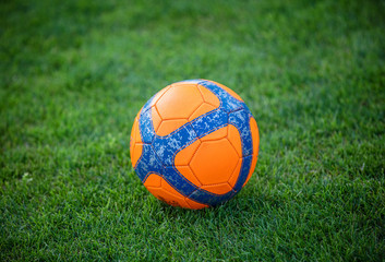 Soccer ball on green grass