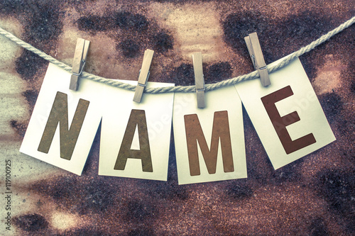 Fotografía Name Concept Pinned Stamped Cards on Twine Theme