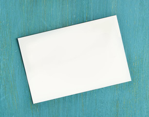 Wall Mural - Blank white business card on turquoise background texture