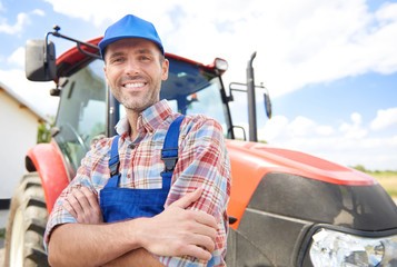 Farmer leaning on the tractor