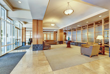 Building Lobby With Marble Floor And Furniture.