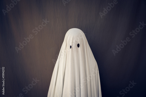 Fotografie, Obraz White Ghost on a gray background. Halloween holiday