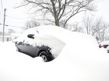 Car Covered In Snow