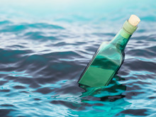 Empty Green Glass Bottle In The Sea