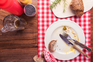 Wall Mural - Dirty plate on restaurant table after meal