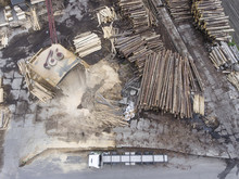 Sawmill. Felled Trees, Logs Stacked In A Pile. View From Above.