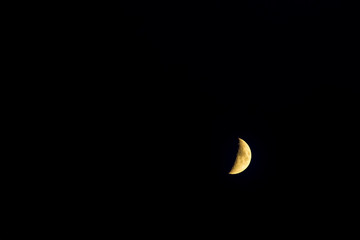 moon against the black sky
