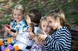 © JackF - Kids with mobile devices outdoor.