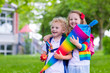 © famveldman - Kids with candy cone on first school day in Germany