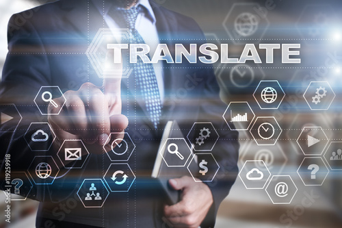 Fotografía Businessman is pressing on the virtual screen and selecting "Translate"