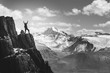 Man stands in winner pose on the cliff. Greyscale