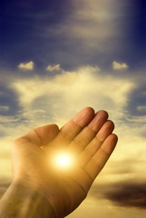 Wall Mural - hope and soul concept with a male hand and light