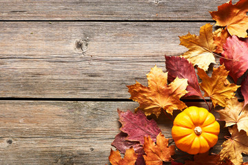 Wall Mural - Autumn leaves and pumpkin