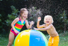 Kids Playing With Water Ball Toy