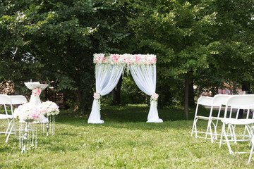 Beautiful white arch for the wedding ceremony