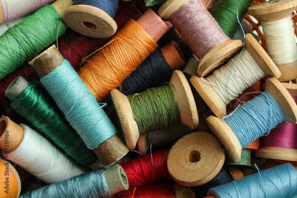 Spool of thread background Stock Photo | Adobe Stock
