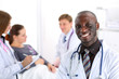 © megaflopp - Black smiling male doctor look in camera