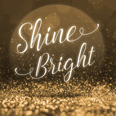 Wall Mural - Inspiration quote,Shine Bright at abstract gold glitter backgrou