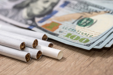 Wall Mural - cigarettes with money on desk