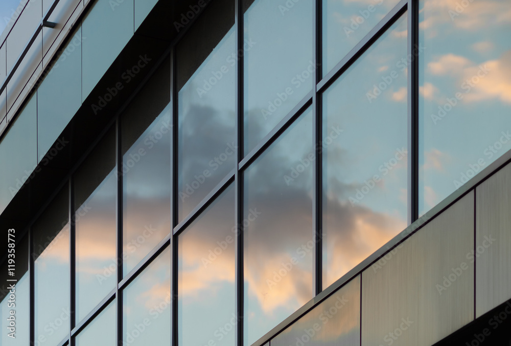 Sky reflected in a glass facade