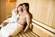 © BGStock72 - Young couple in the sauna