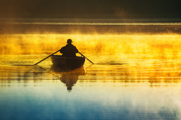 Wall Mural - man fishes in the lakes of the Mazury