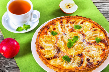 Sticker - Apple pie sprinkled with icing sugar decorated with mint leaves