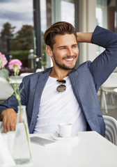 Portrait of handsome smiling business man