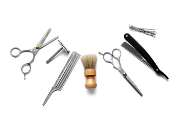 Wall Mural - Vintage tools of barber shop on white background