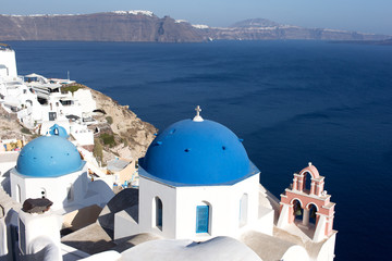 Wall Mural - Santorini Island - view of the white city and the blue sea