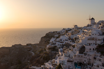 Wall Mural - Santorini Island  - view of the famous windmills at sunset