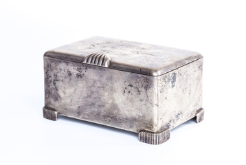 Old silver metallic retro casket over white background